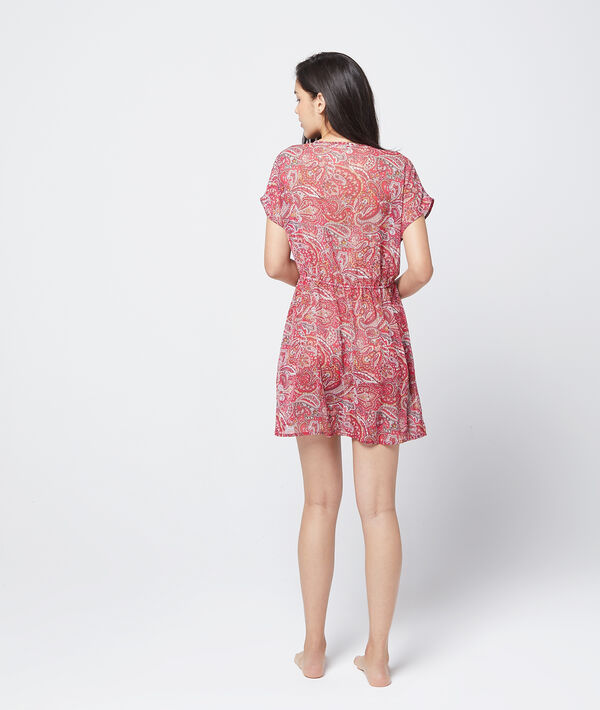 Robe imprimée à pompons rouge.