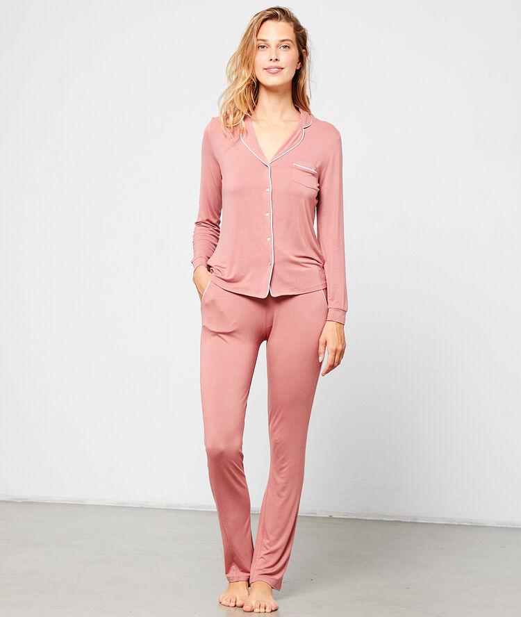 Pantalon de pyjama à bandes latérales rose.