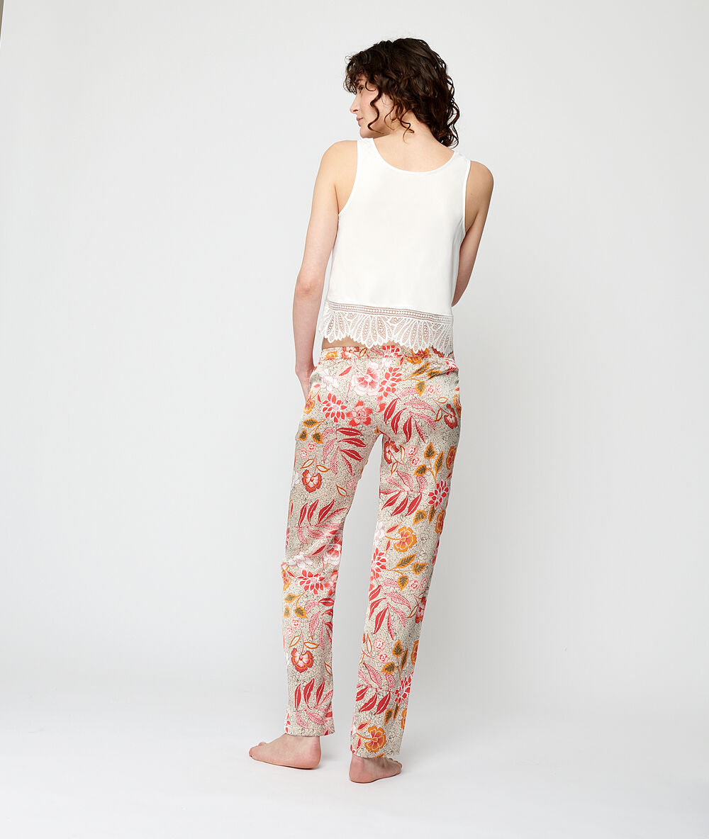 Pantalon satiné imprimé rouge.
