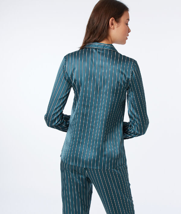 Chemise de pyjama satinée à rayures bleu.