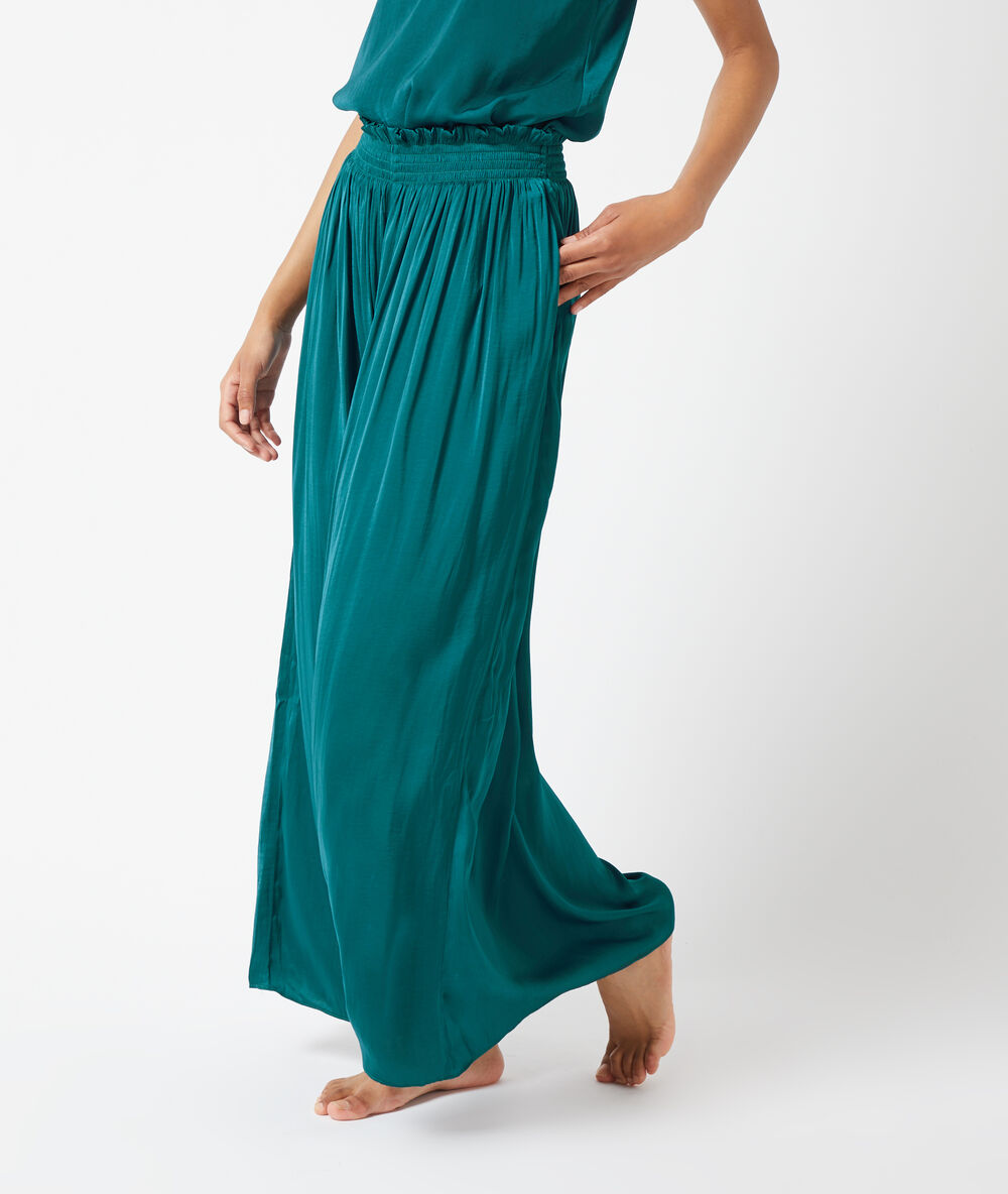 Pantalon satiné, smocké à la taille bleu canard.