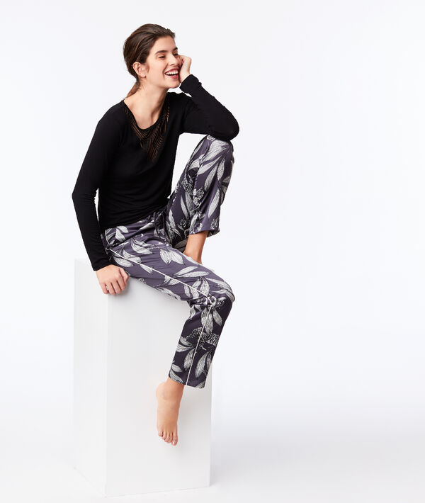 Pantalon large imprimé floral gris.