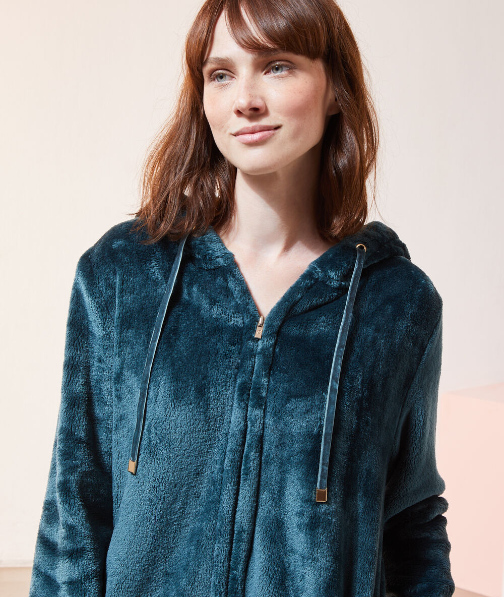 Veste polaire à capuche bleu canard.