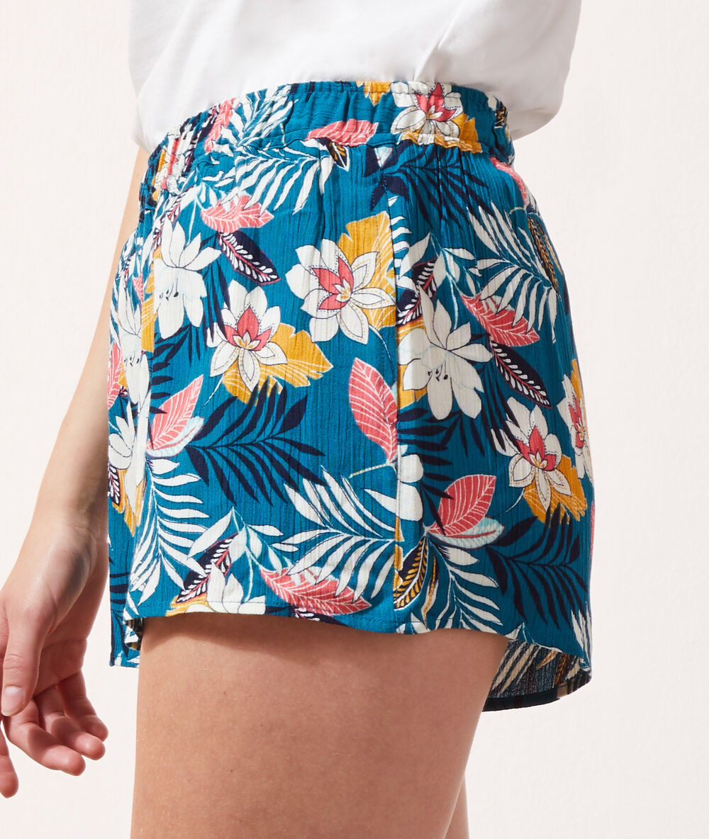 Short imprimé floral bleu canard.