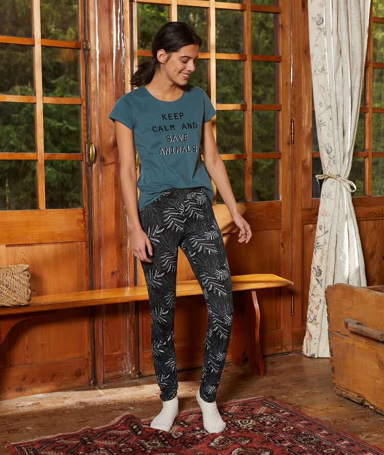 Pantalon imprimé palme noir.