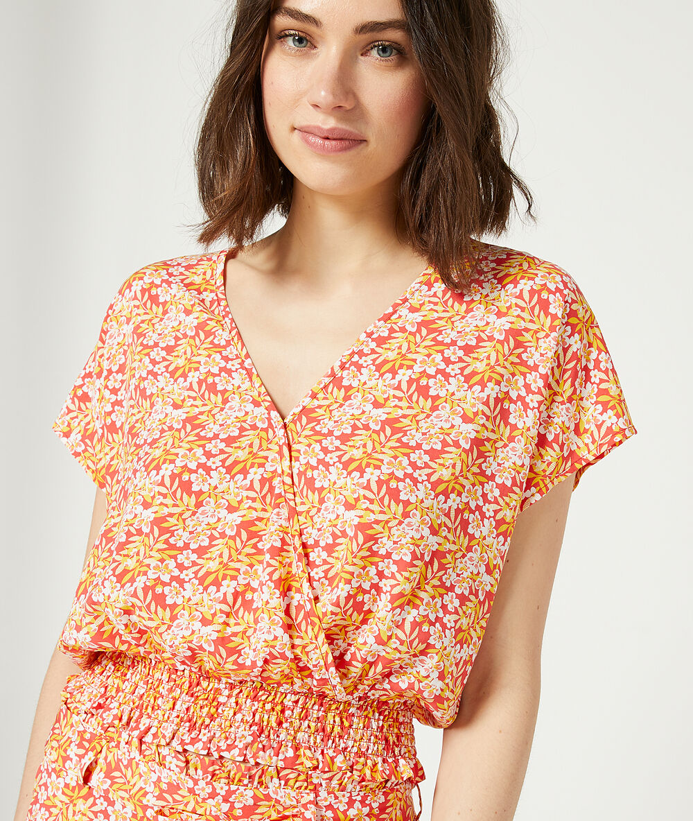 Top smocké imprimé fleuri corail.