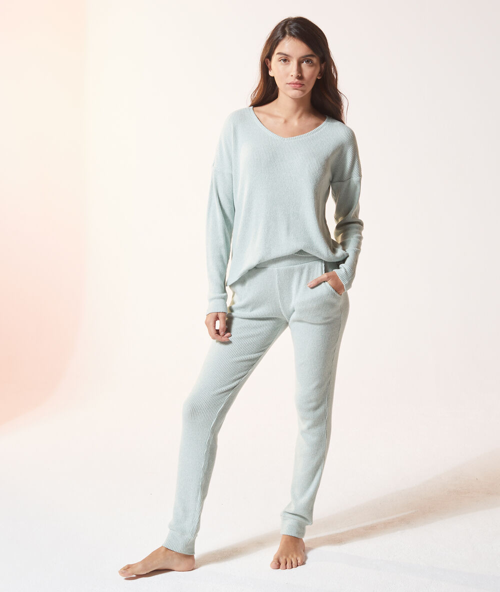Pantalon matière côtelée vert.