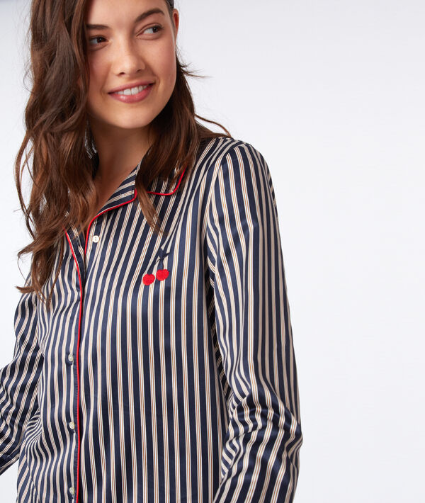 Chemise de pyjama satinée à rayures bleu nuit.