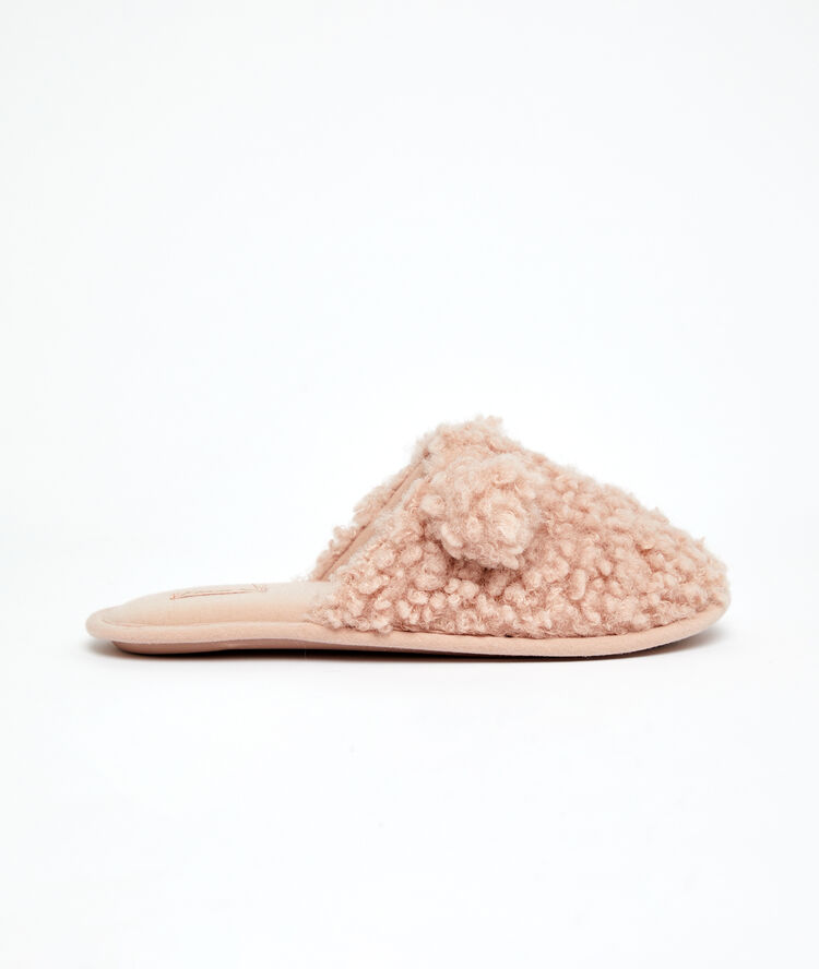 Mules doudou à pompons rose.