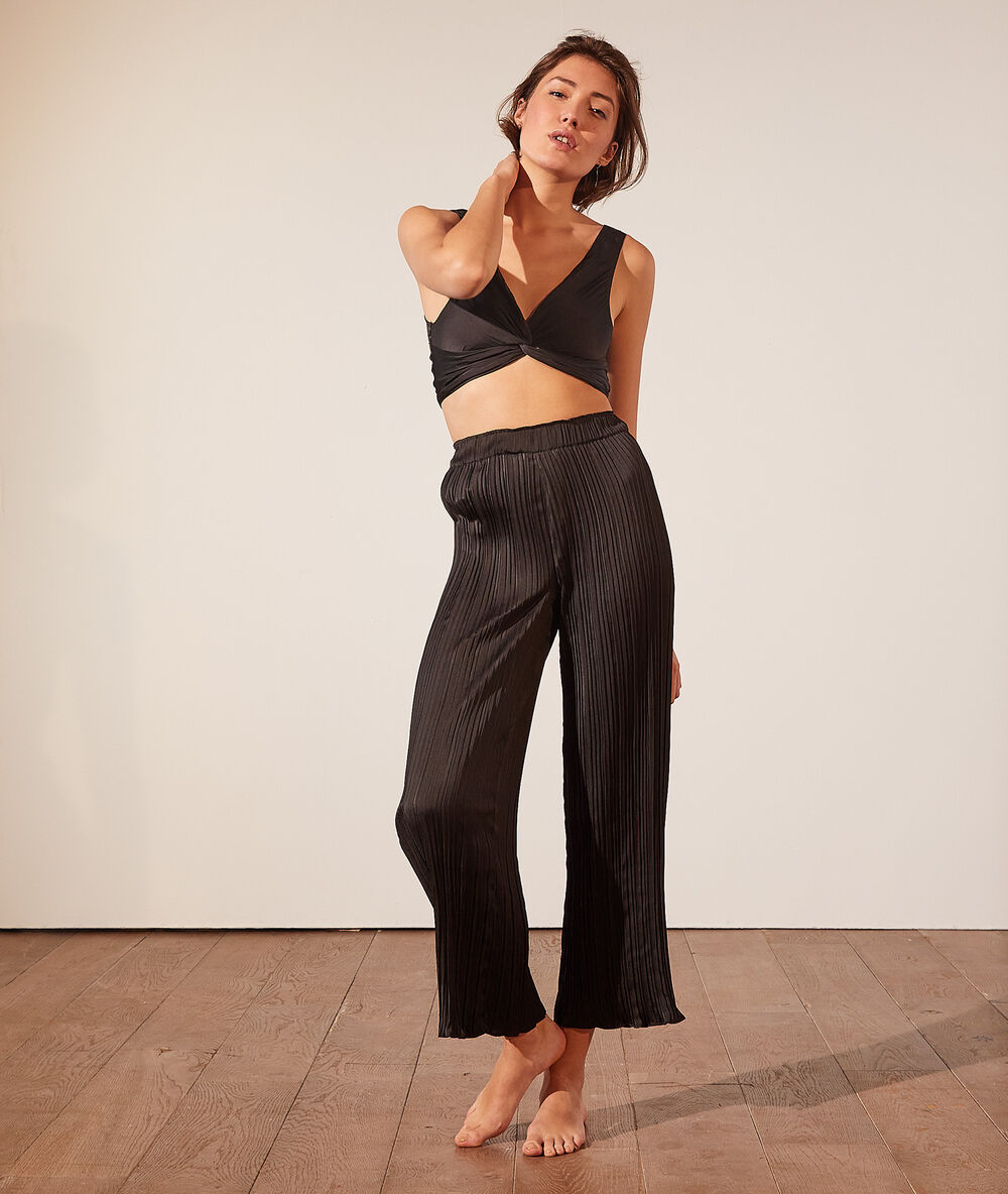 Crop top noué satiné noir.