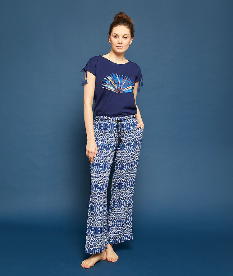 Pantalon évasé imprimé ethnique bleu.