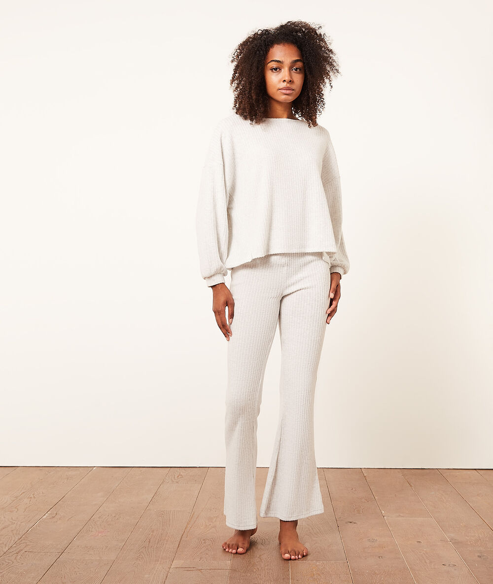 Pantalon évasé côtelé ecru.