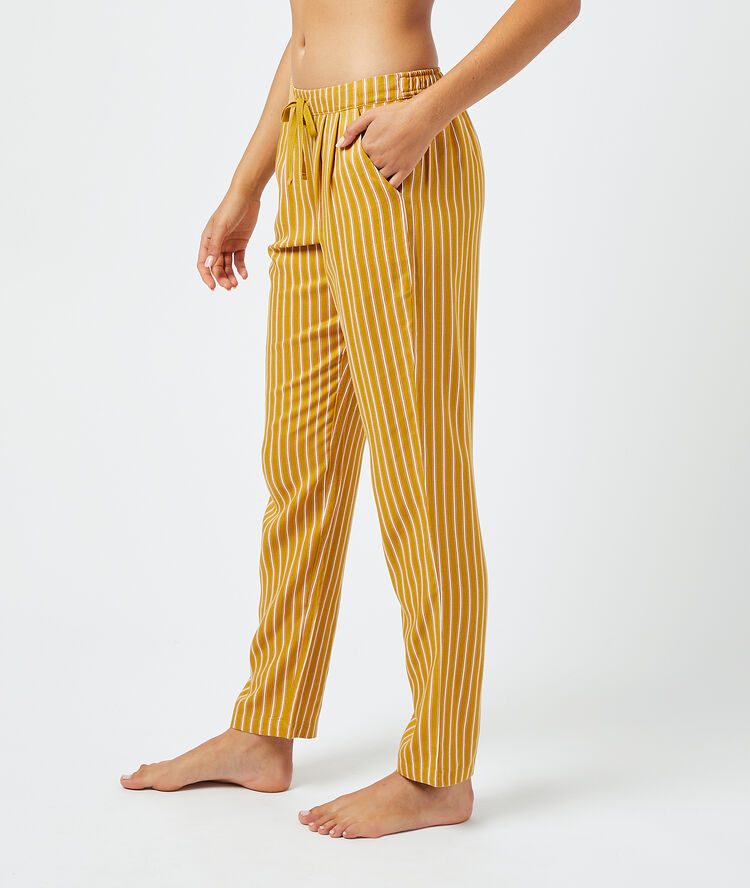 Pantalon à rayures anis.