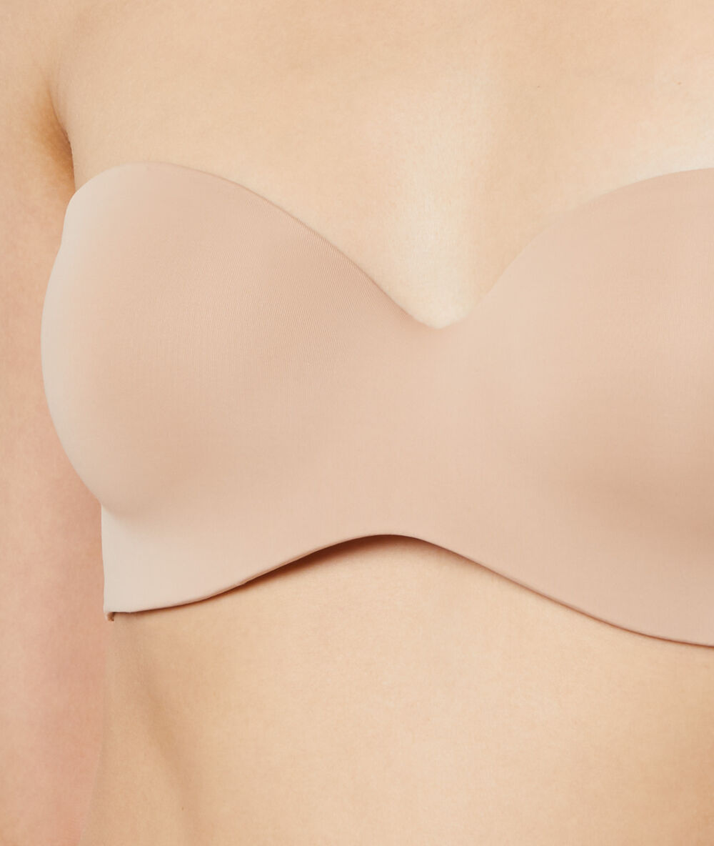Soutien-gorge sans armatures à coques fines en microfibre naturel.