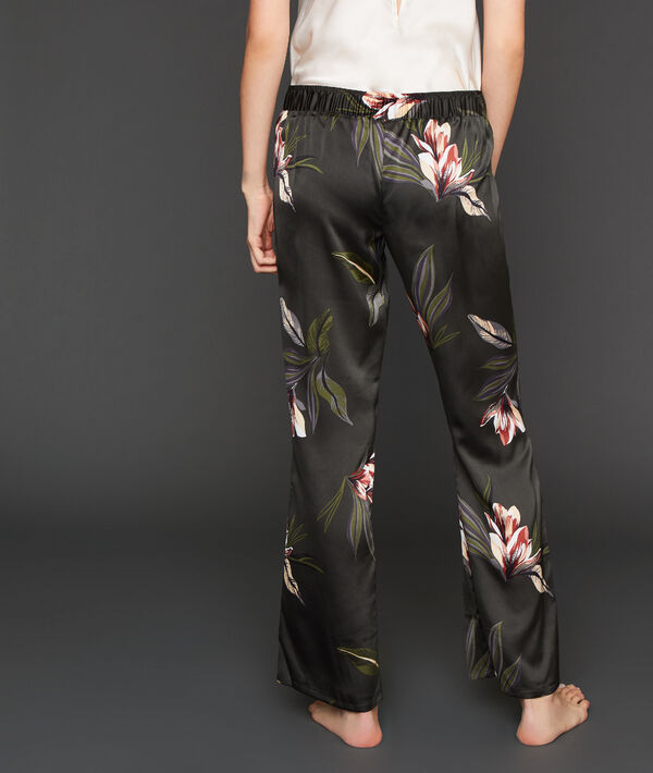 Pantalon large satiné imprimé floral kaki.