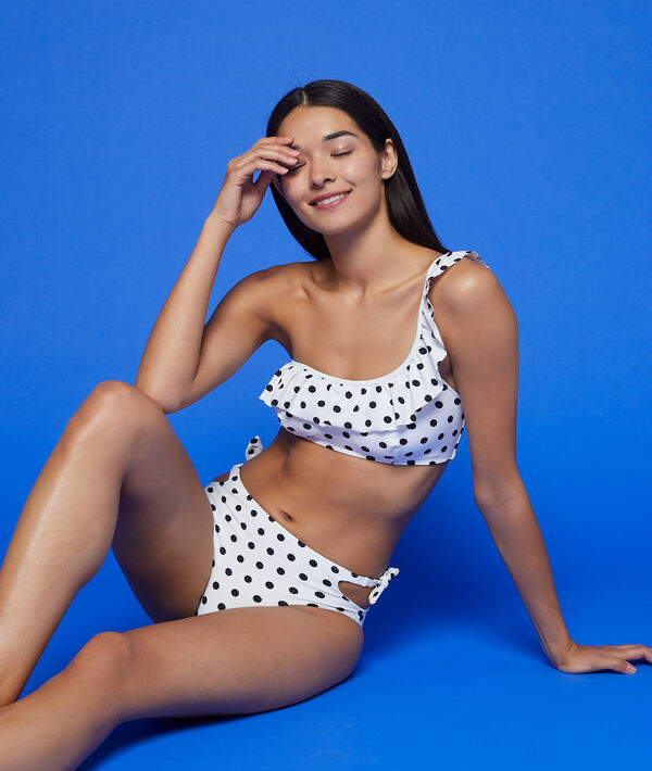 Bikini taille haute à pois blanc.