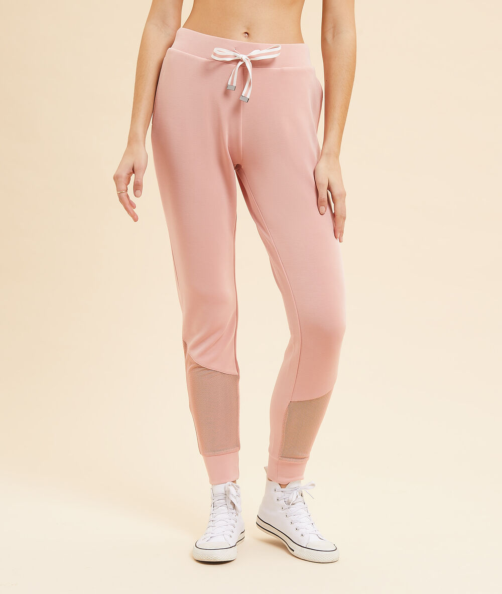 Pantalon de sport détails en tulle rose poudre.