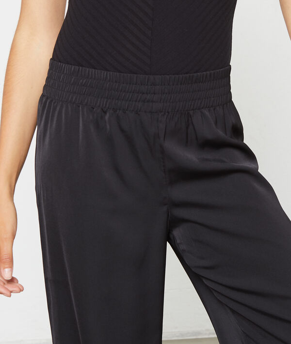 Pantalon satiné large ceinture élastiquée noir.