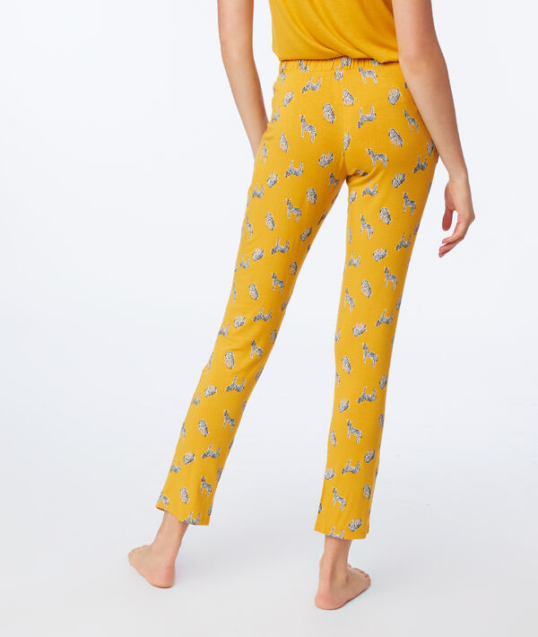 Pantalon de pyjama imprimé zèbres ocre.