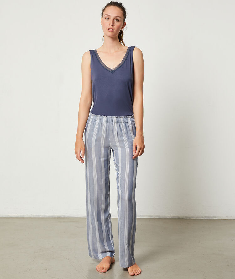 Pantalon à rayures bleu.