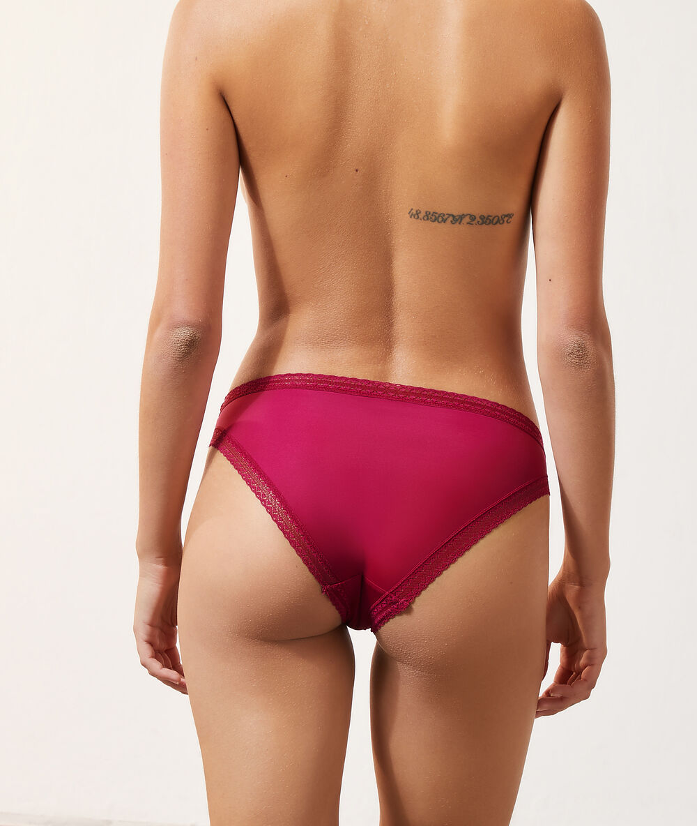 Culotte bi-matière fushia.