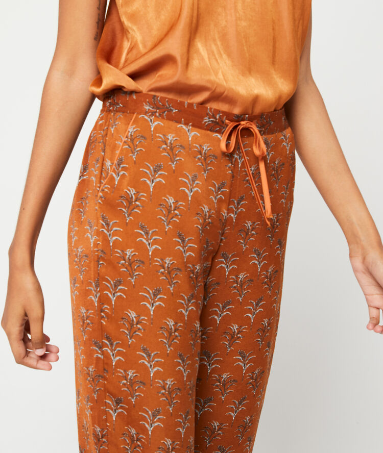 Pantalon imprimé ocre.