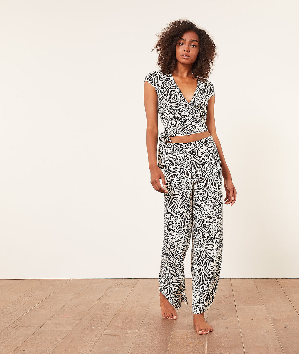 Pantalon taille haute évasé imprimé ecru.