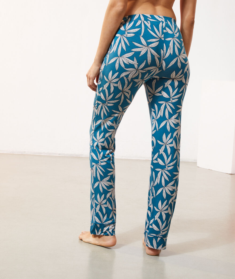 Pantalon imprimé feuillage bleu canard.