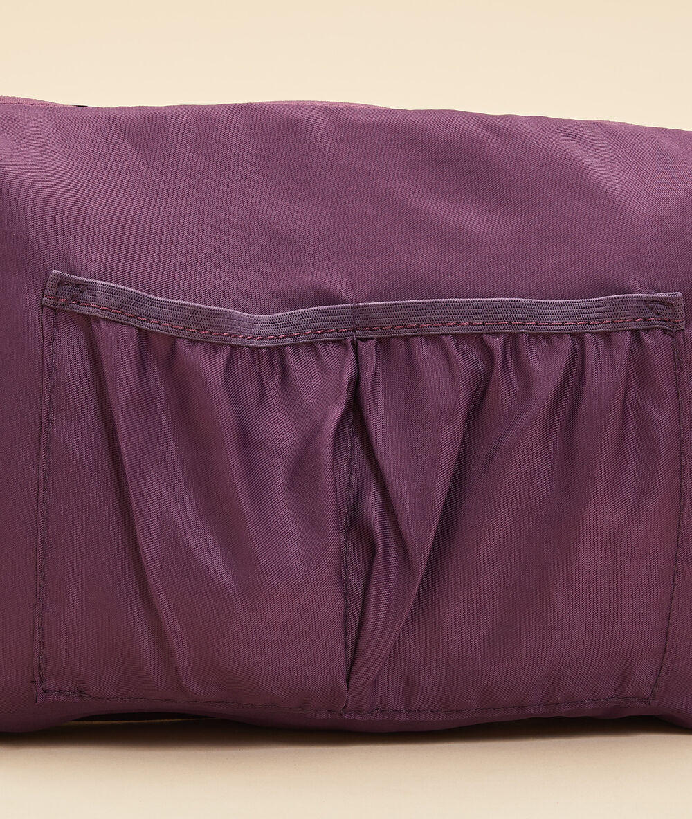 Trousse imprimé fleuri violet.