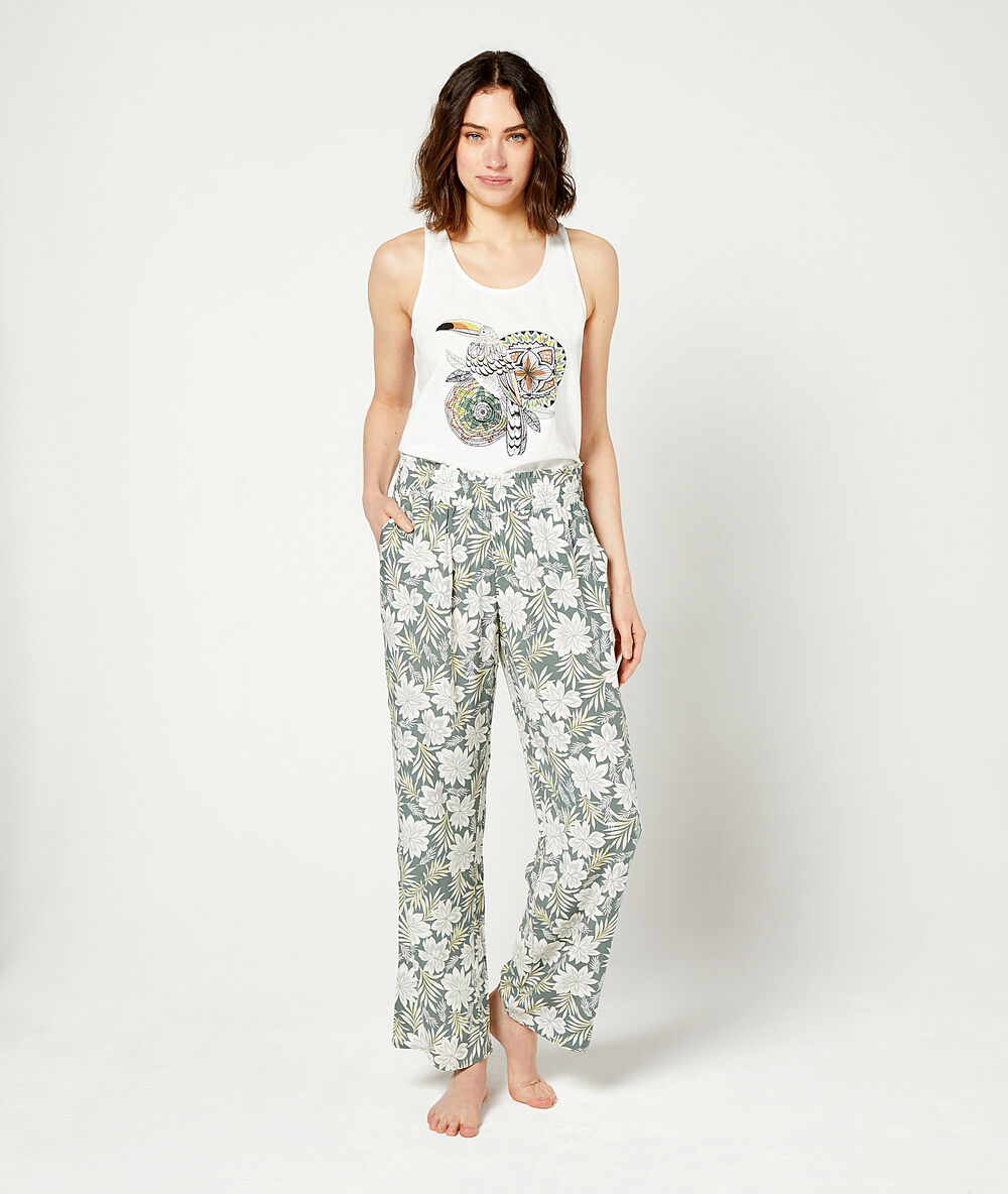 Pantalon imprimé fleuri kaki.