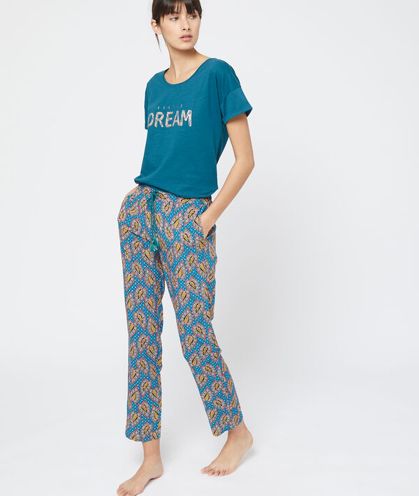 Pantalon imprimé bleu.