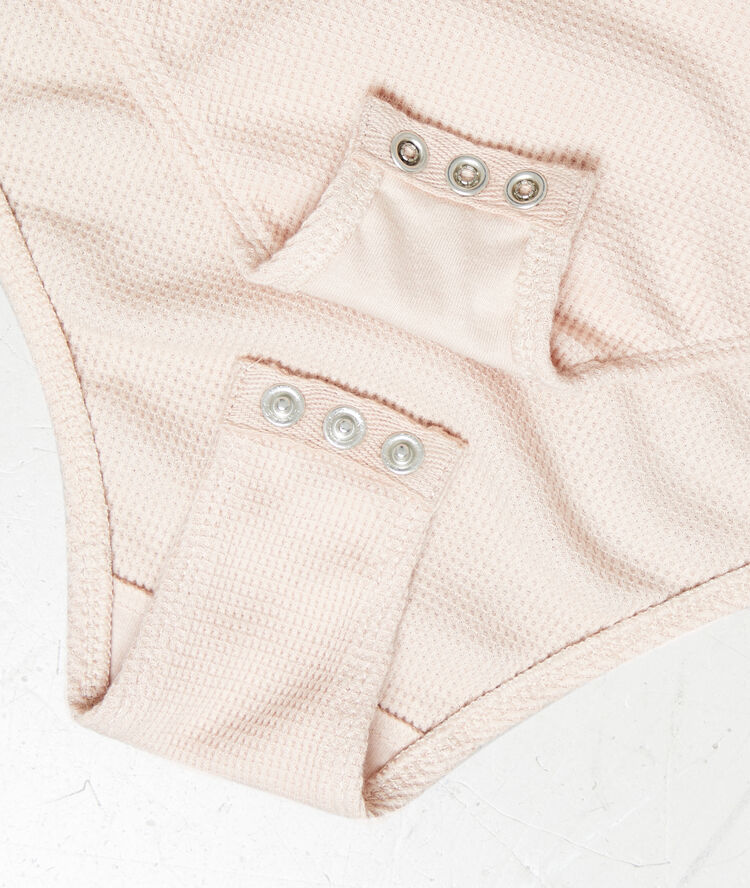 Body à manches courtes en coton rose.