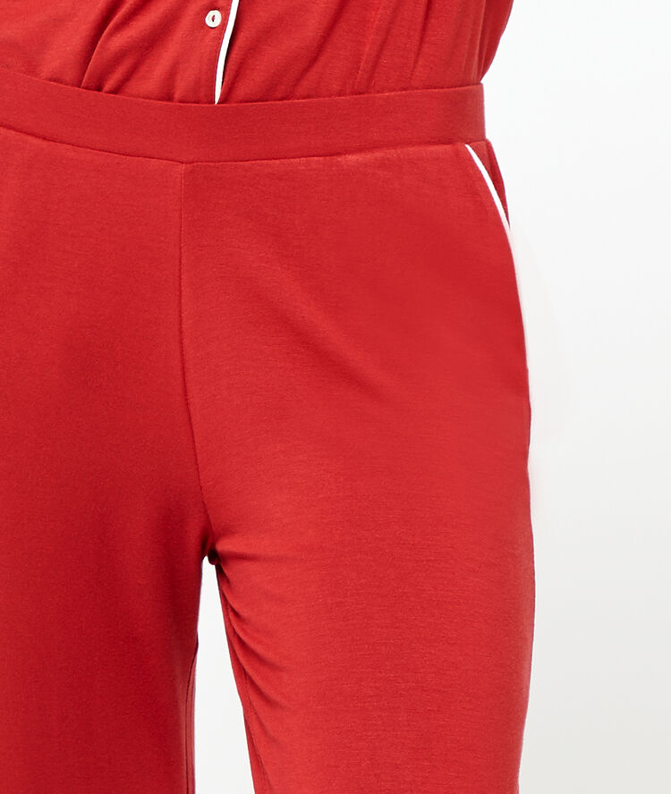 Pantalon brique roux.