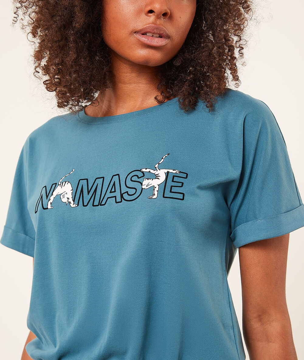 Top manches courtes "namaste" bleu canard.