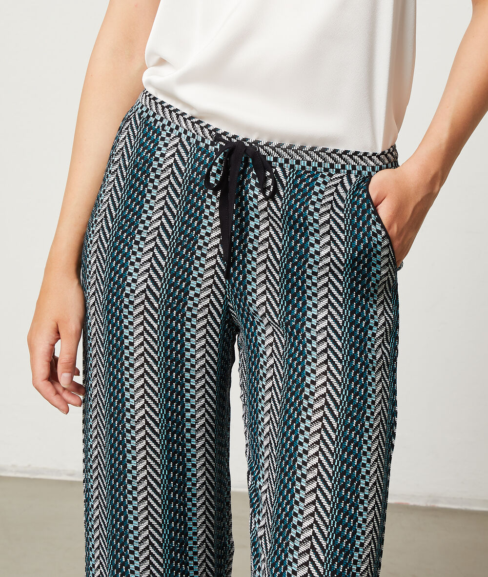 Pantalon imprimé graphique noir.