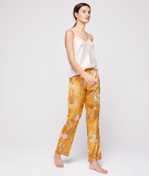 Pantalon satin imprimé jaune.