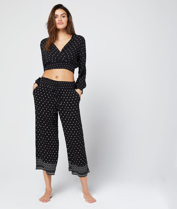 Crop top forme cache-coeur noir.