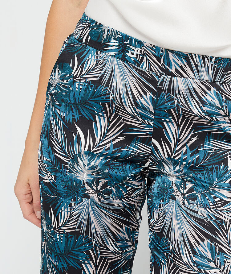 Pantalon imprimé feuillage noir.