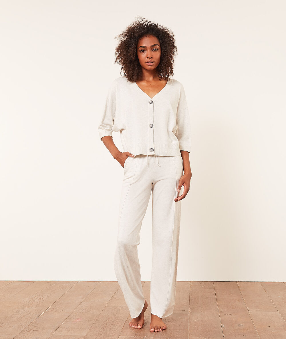 Pantalon de pyjama large gris clair.