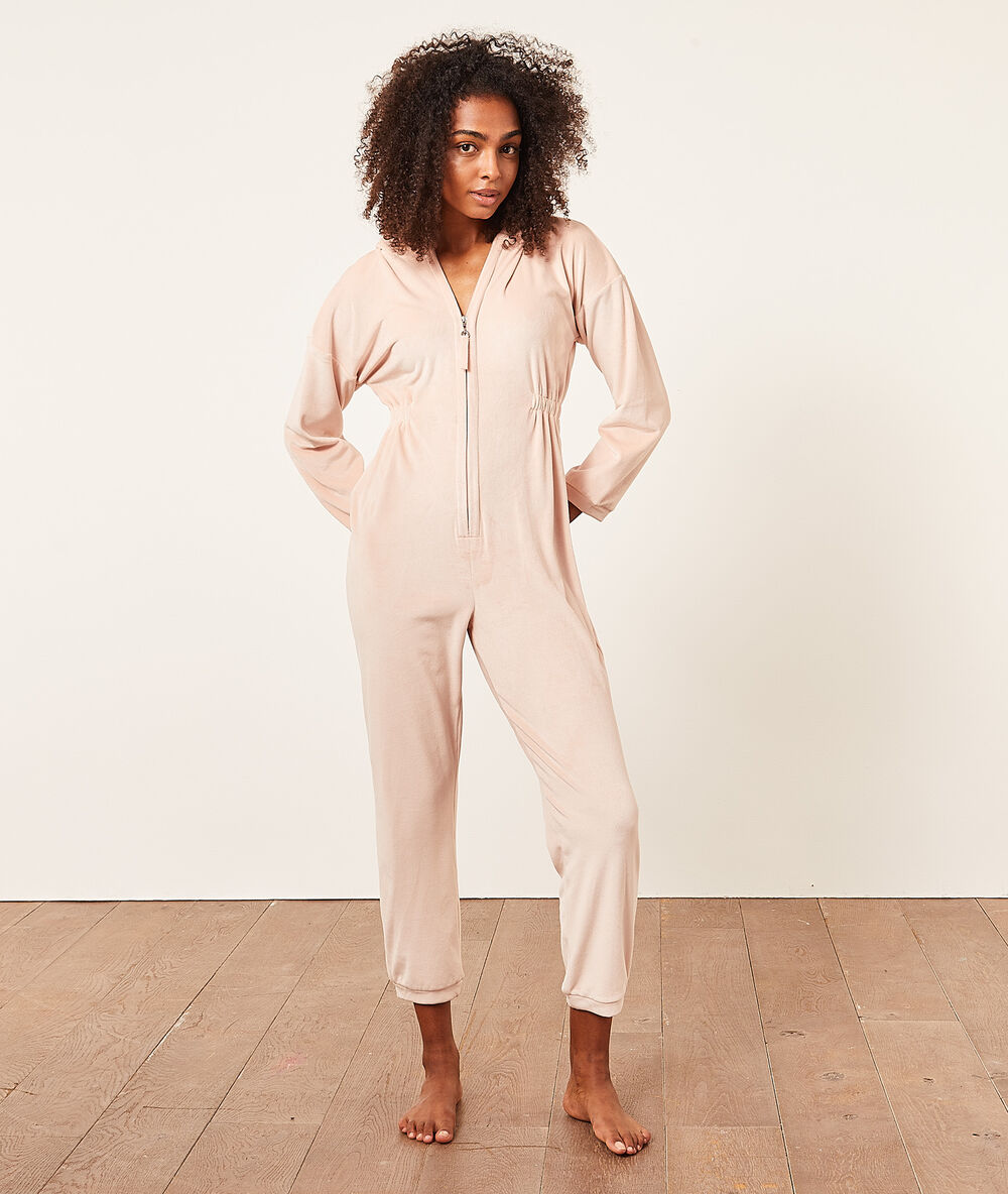 Combinaison manches longues zippée rose poudre.