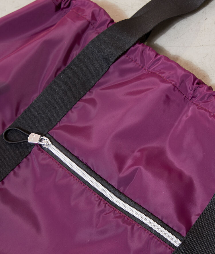Sac de sport prune.