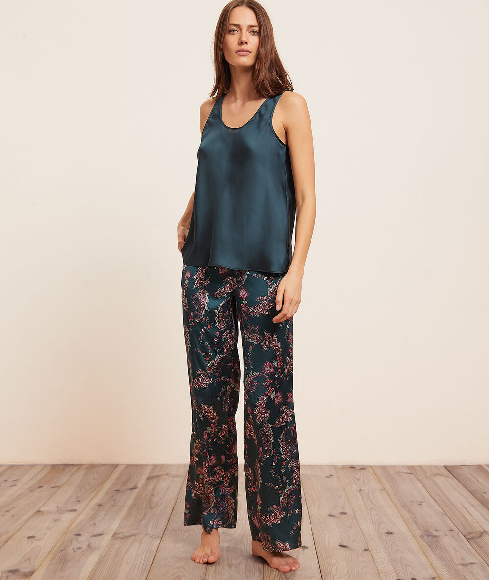 Pantalon satiné imprimé vert.