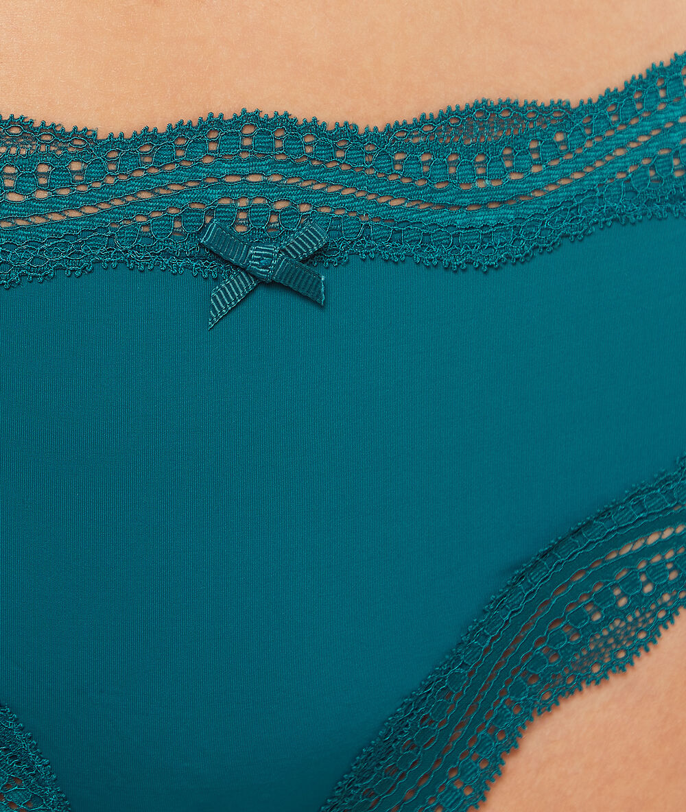 Shorty en micro bords dentelle vert.