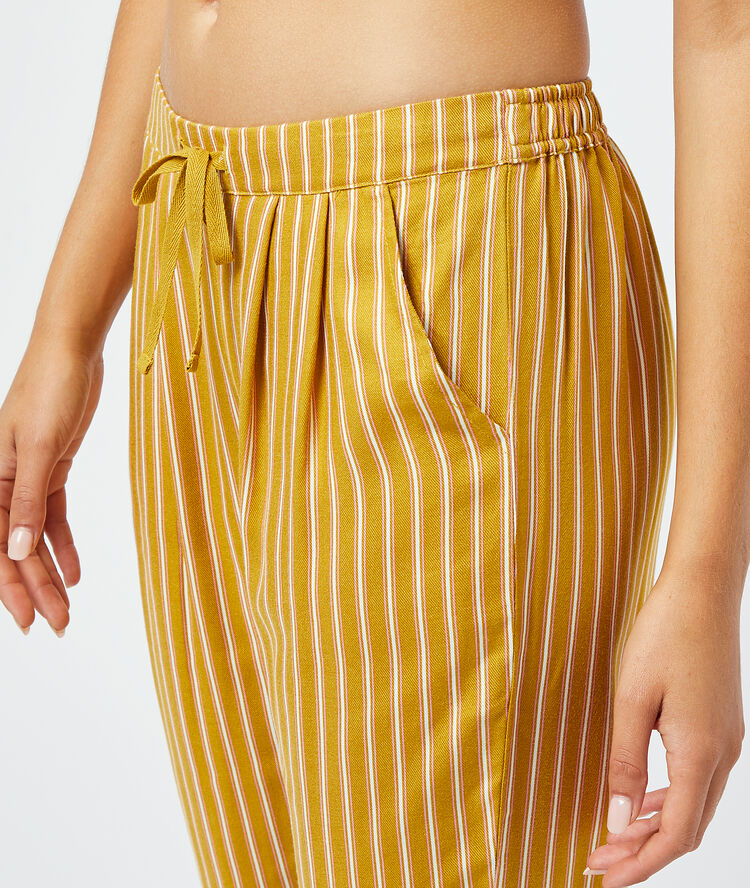 Pantalon à rayures anis.
