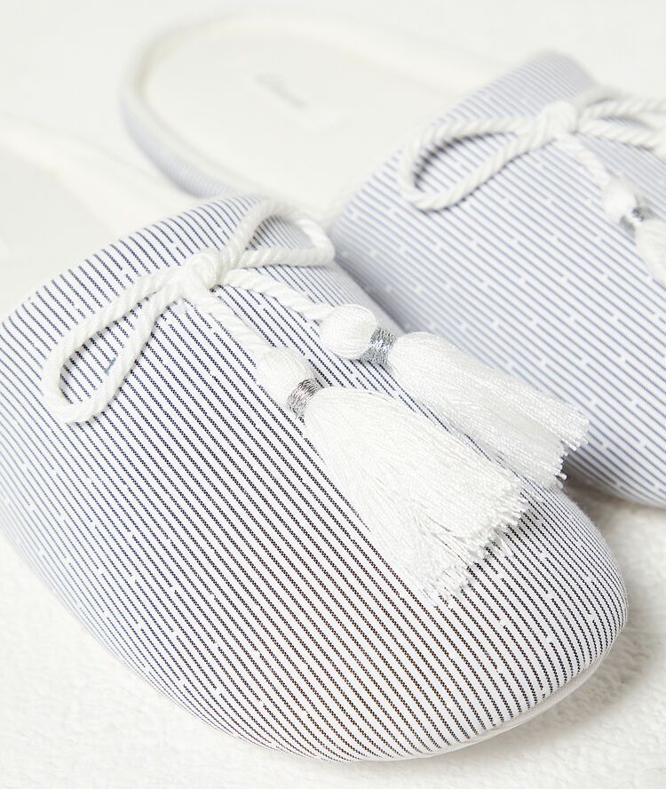 Chaussons mules turquoise.