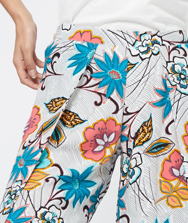 Pantalon capri imprimé bas échancré bleu.