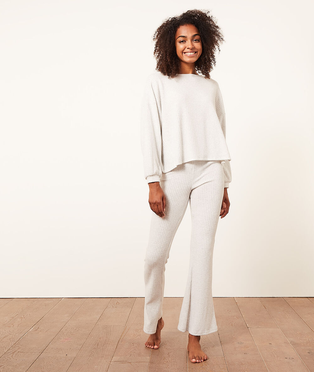 Pantalon évasé côtelé ecru.