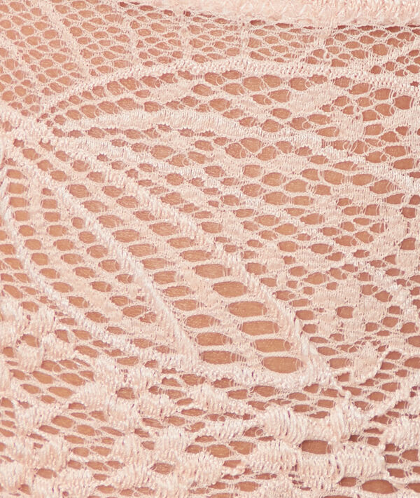 Tanga en dentelle naturel.