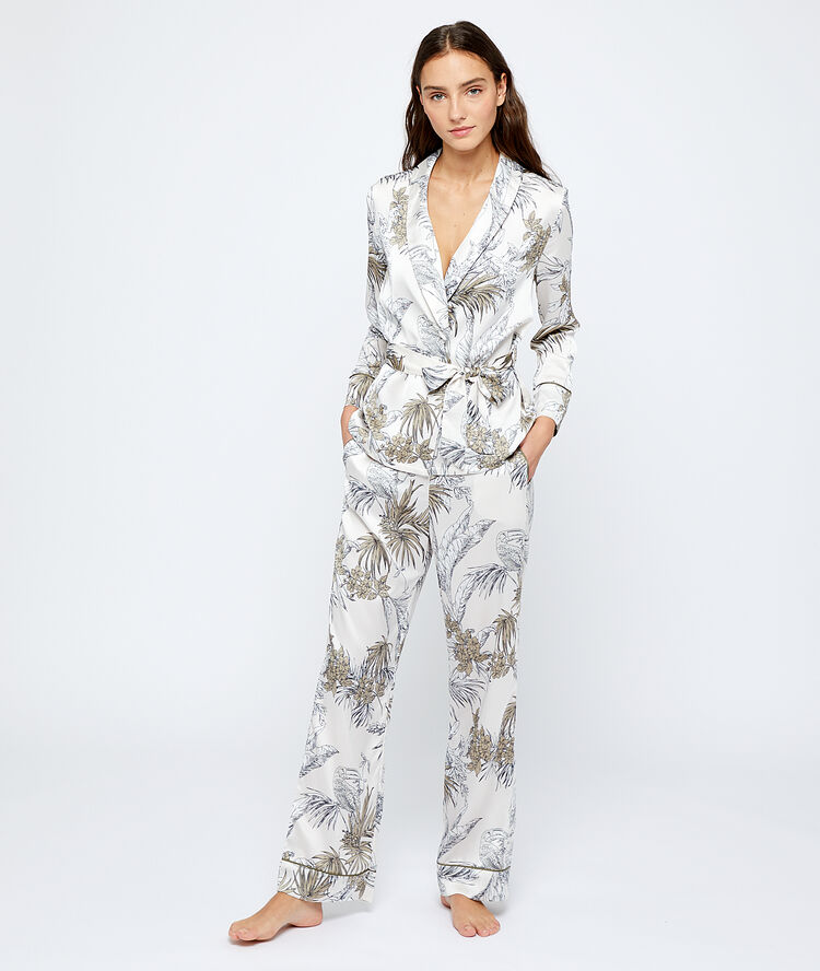 Pantalon imprimé feuillage blanc.