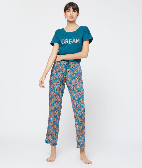 Pantalon imprimé bleu.